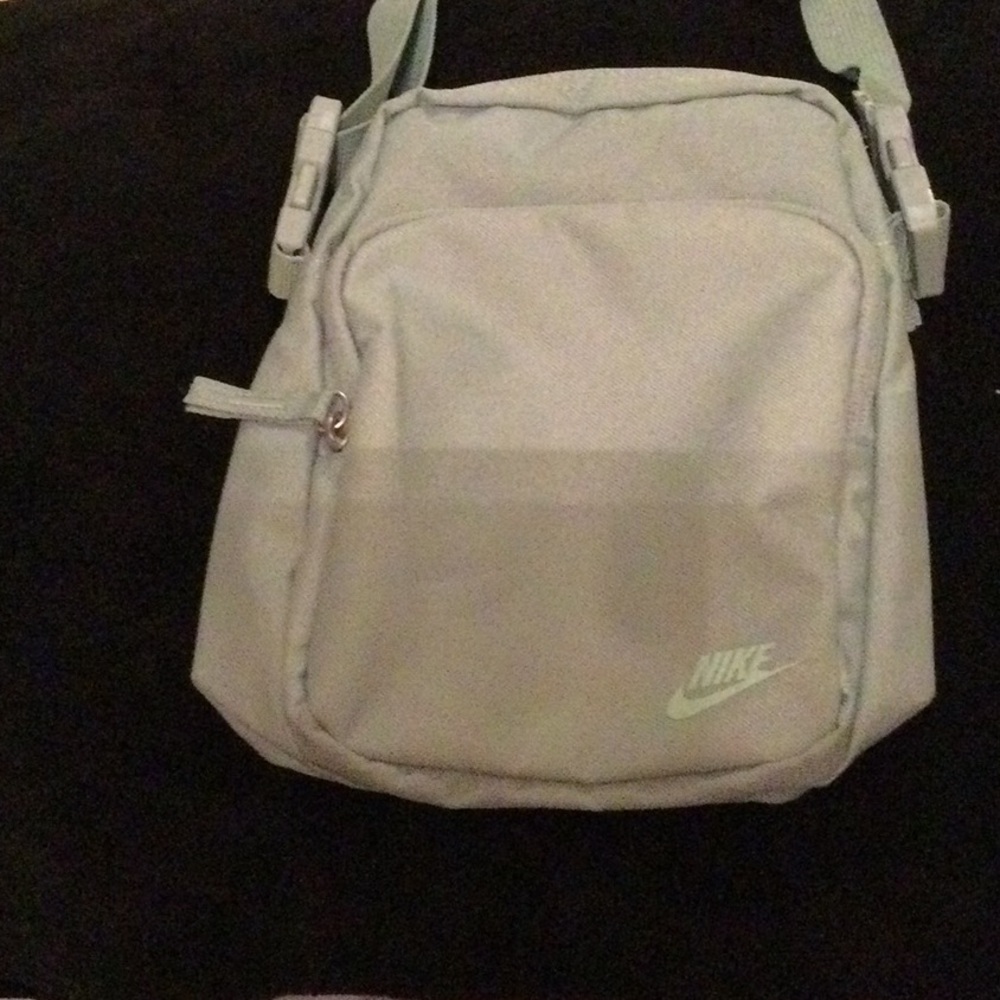 Nike Green Messenger Bag with Zipper Closure and Subtle Logo